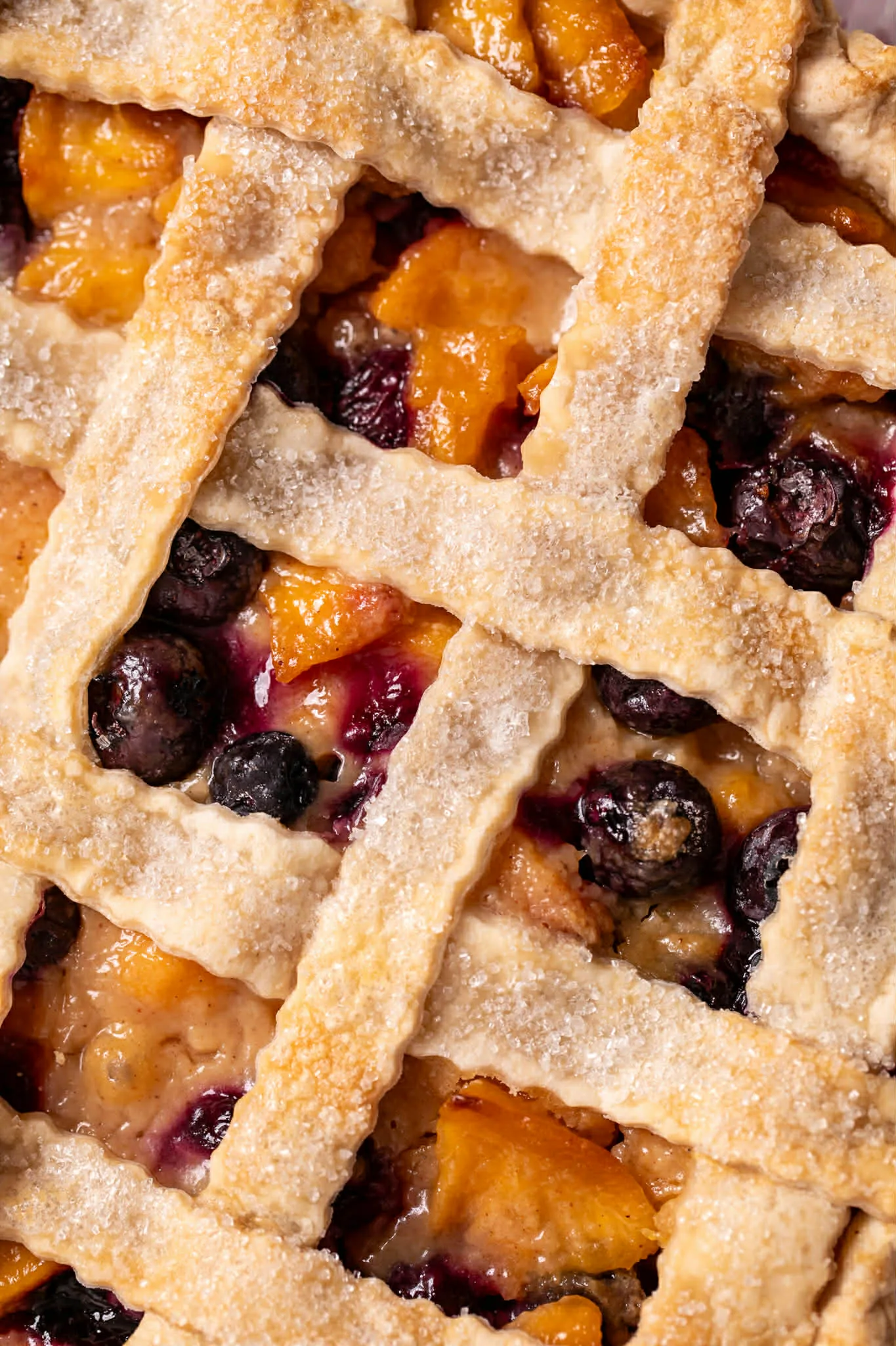 slice-of-heaven-bellingham-blueberry-peach-lattice-pie-closeup image