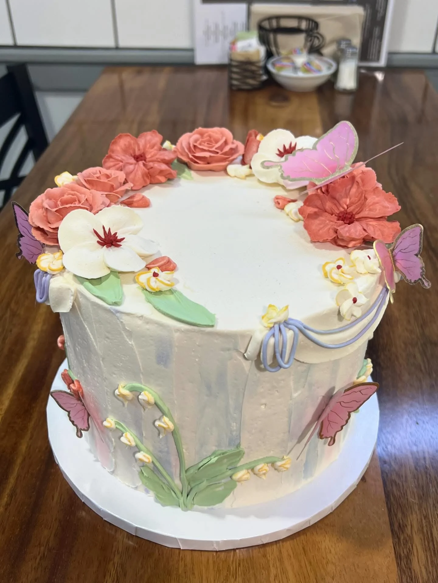 slice-of-heaven-bellingham-custom-cake-floral-garden-painted image