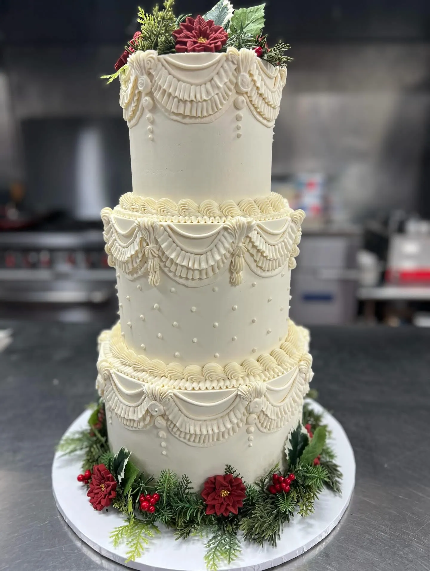 slice-of-heaven-bellingham-custom-cake-three-tier-christmas-poinsettia image