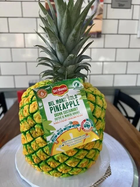 slice-of-heaven-bellingham-custom-cake-realistic-pineapple-sculpt Image