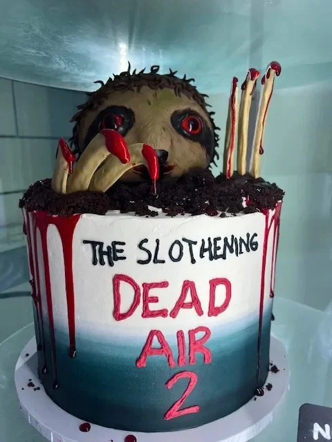 slice-of-heaven-bellingham-custom-cake-zombie-sloth-horror-slothening-dead image