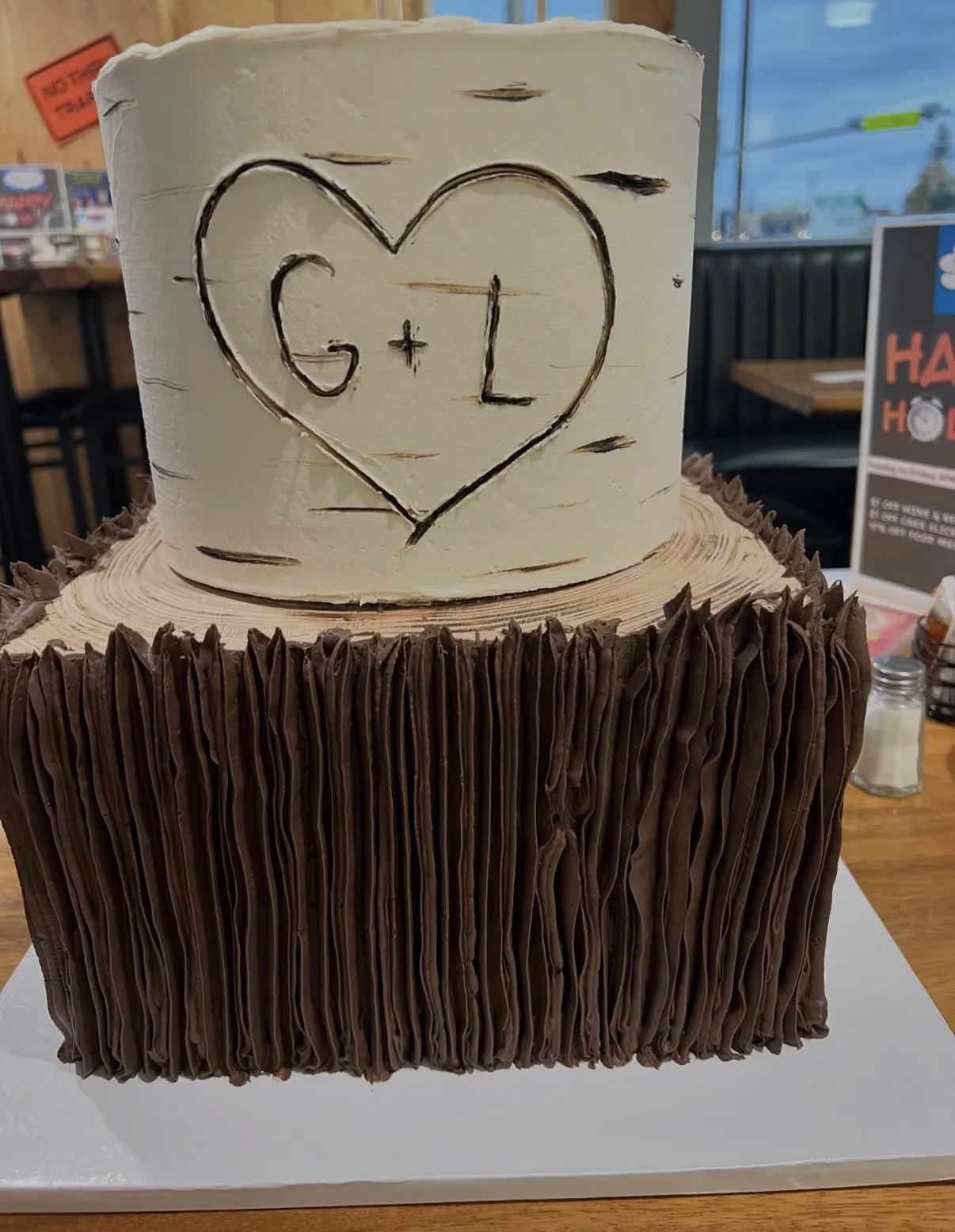 slice-of-heaven-bellingham-sculpted-cake-birch-log-carved-heart image