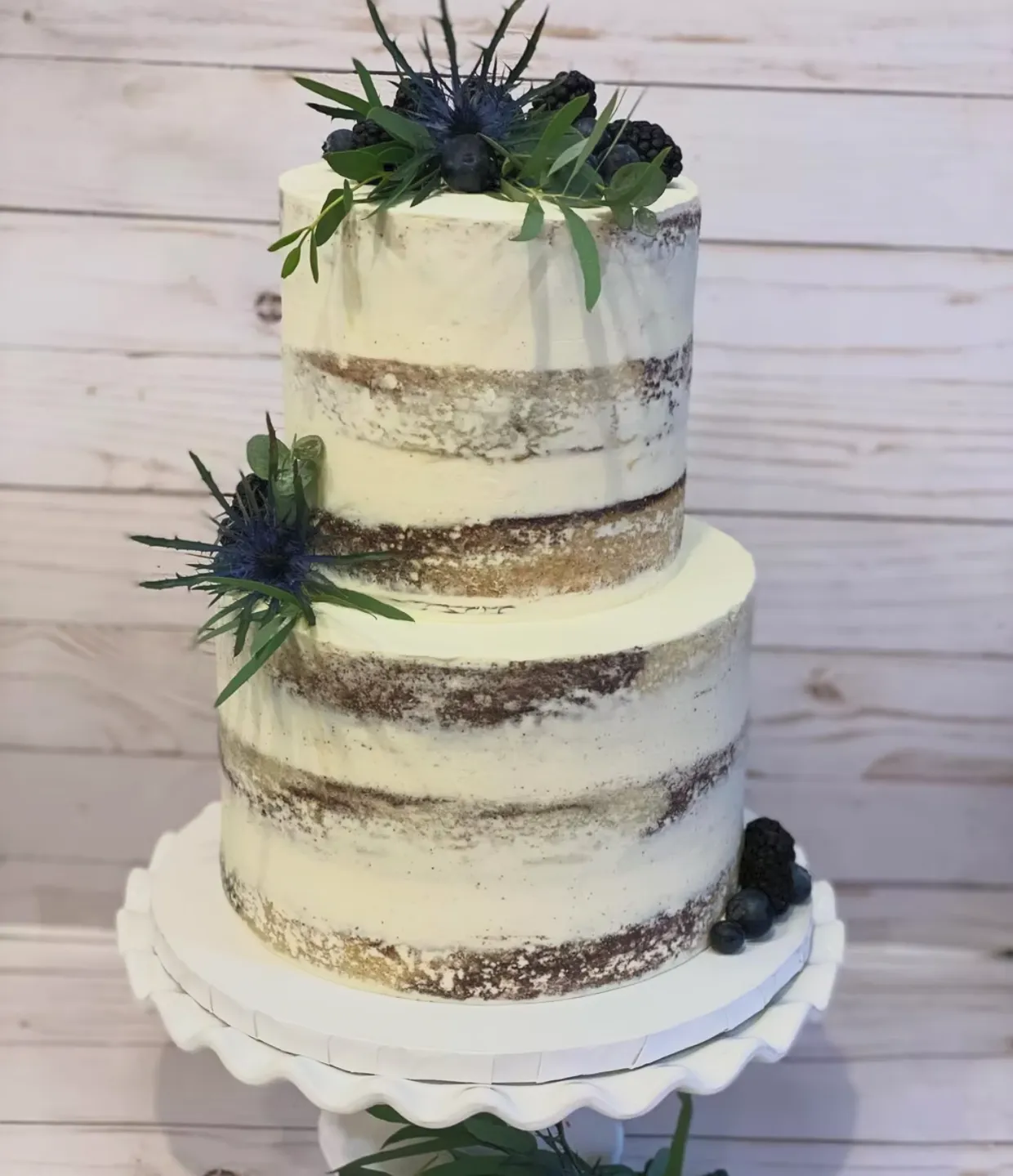 slice-of-heaven-bellingham-wedding-cake-rustic-semi-naked-blue-thistle image