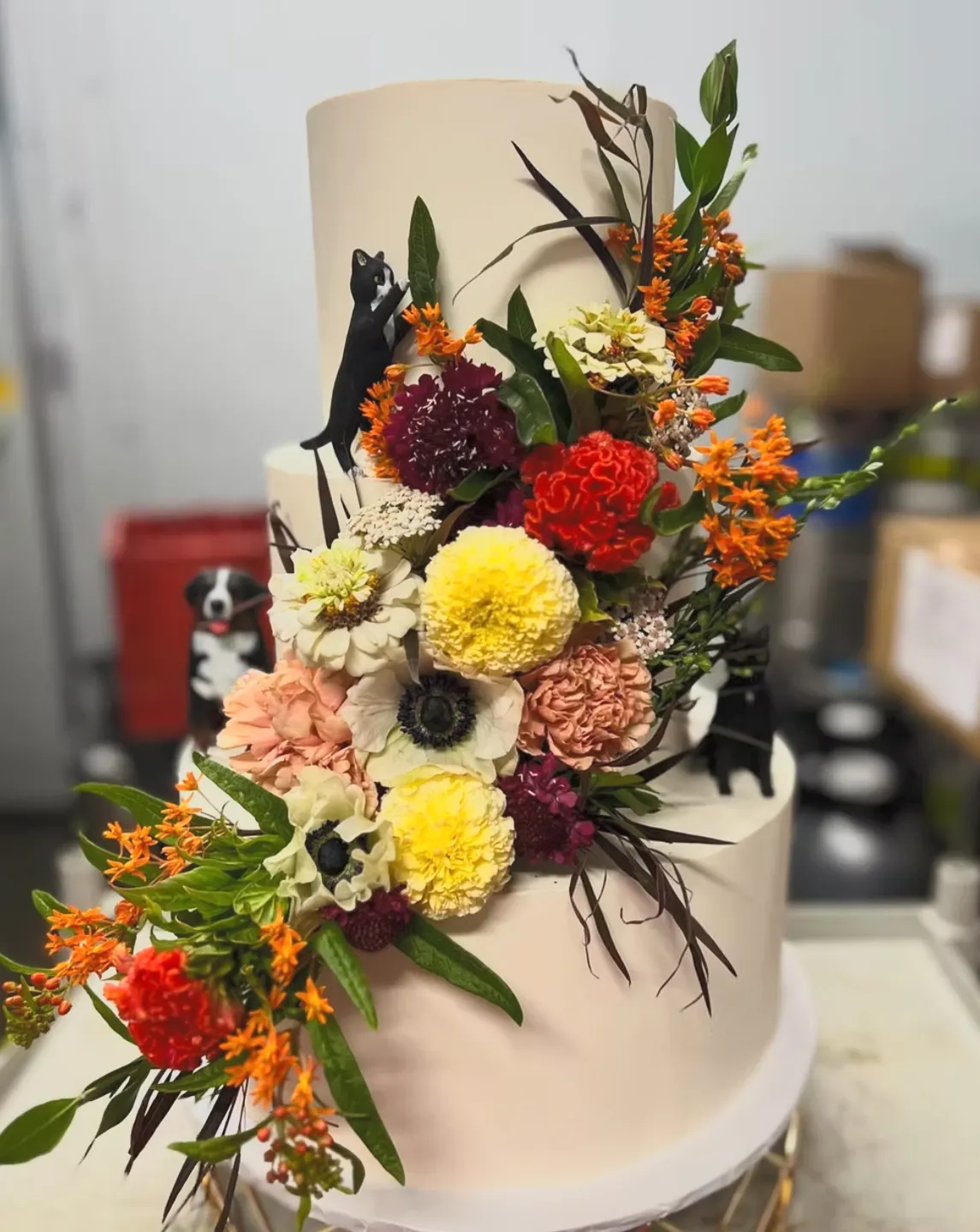 slice-of-heaven-bellingham-wedding-cake-three-tier-autumn-wildflower-cascade image